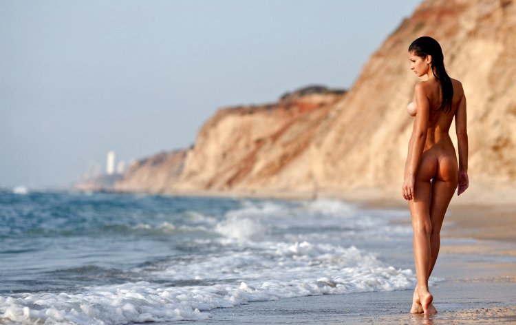Erotic photo shoot on the beach