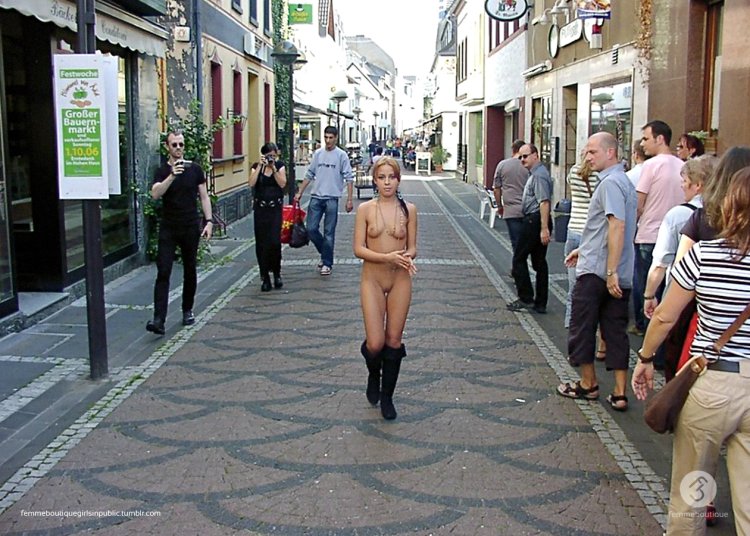 Woman undresses in public