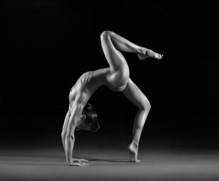 Naked women are engaged in gymnastics