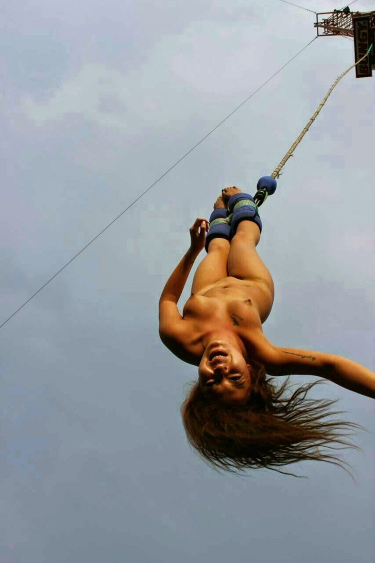 Naked girls jump into the water