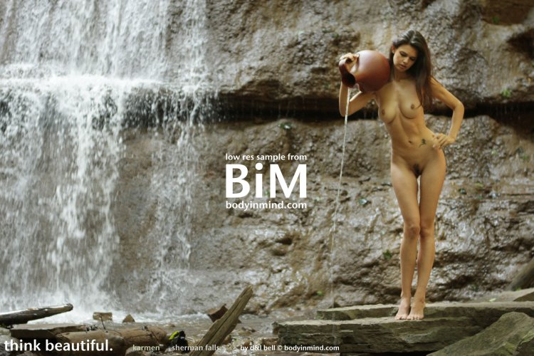 Naked woman with a scythe and a broom