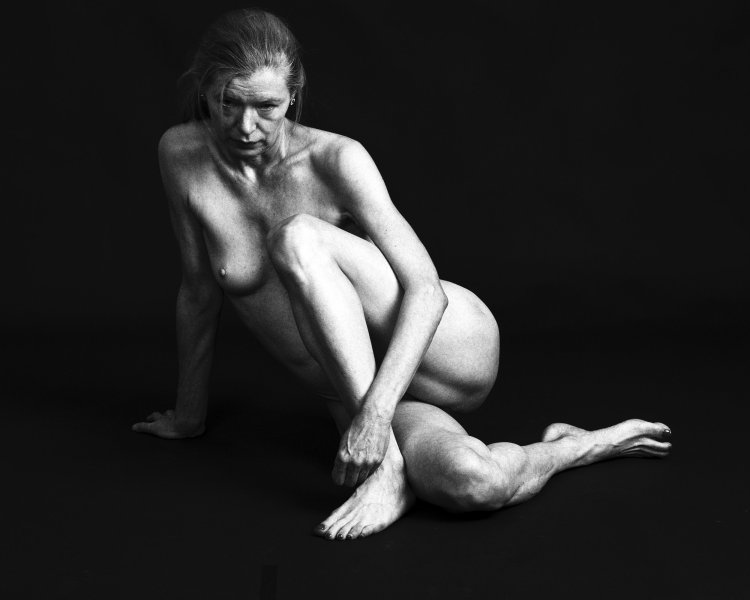 Naked women with extended legs