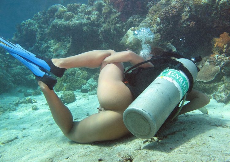 Nikky Thorne under water with porn  scuba gear