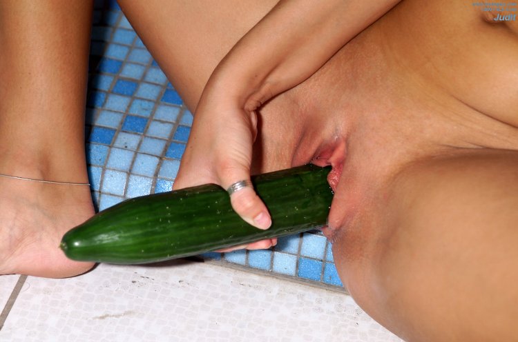 Long cucumber in the pussy