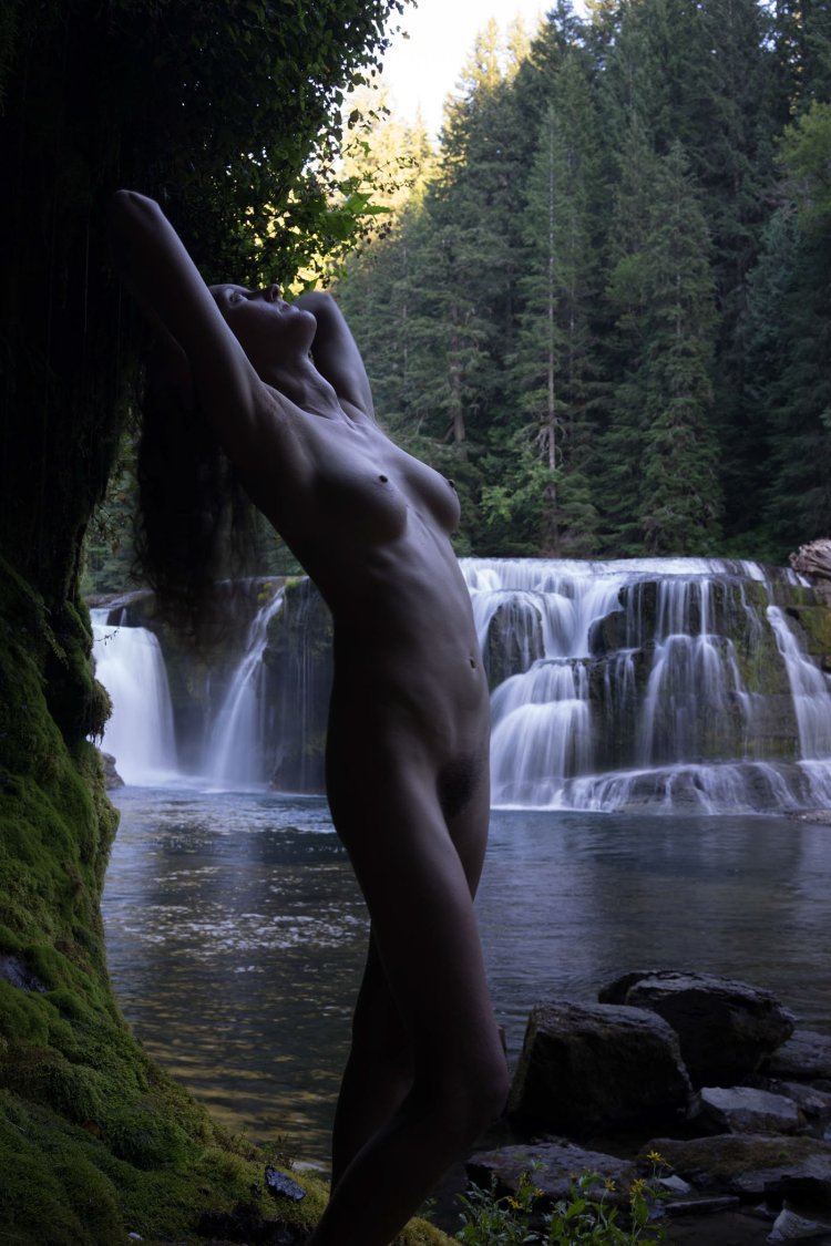 Naked girls at the waterfall