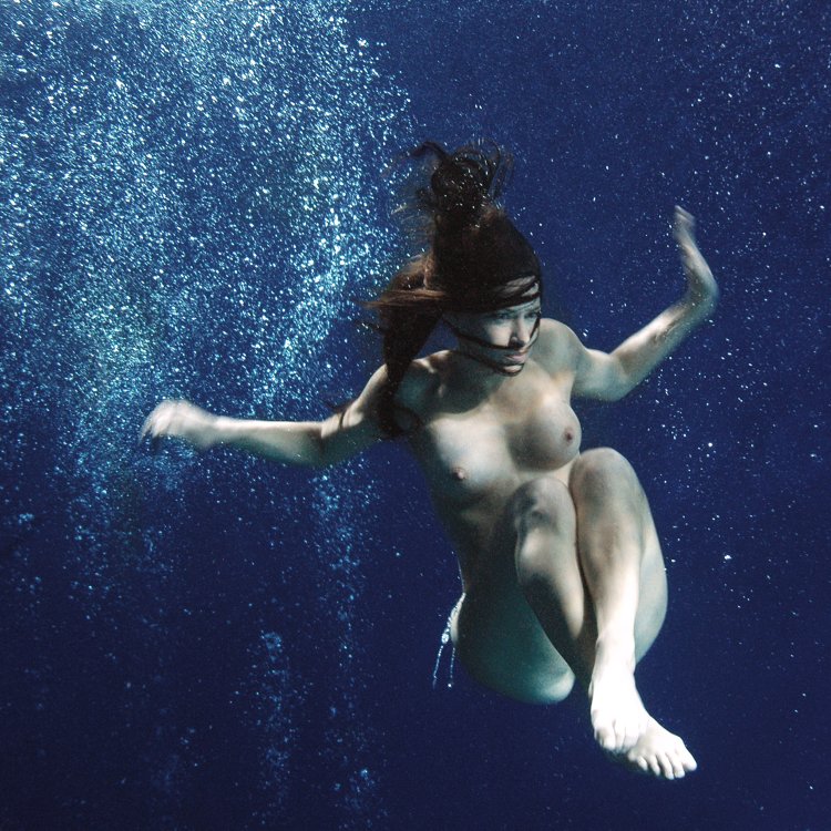 Wild sexy naked women dive under water