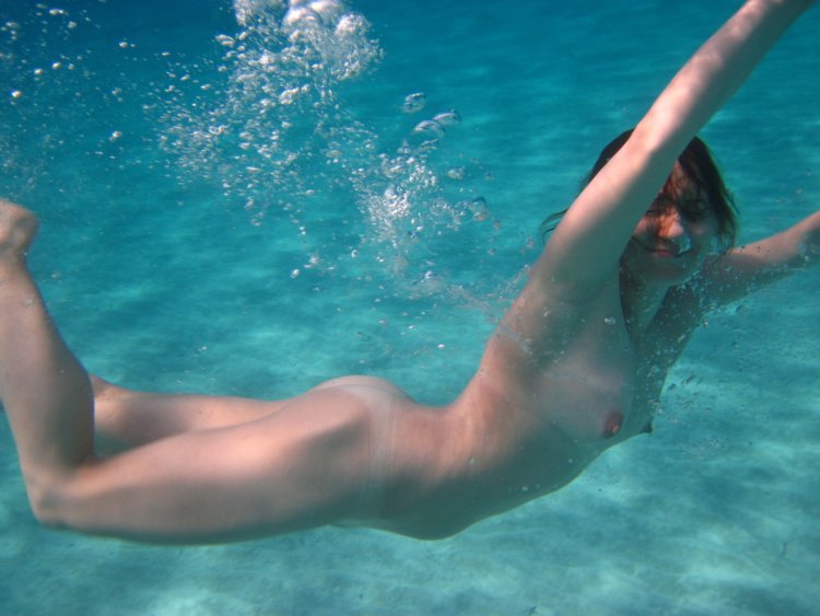 Naked on the beach underwater shooting