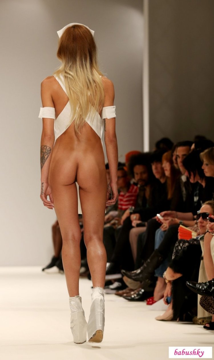 Fashion show with bare breasts