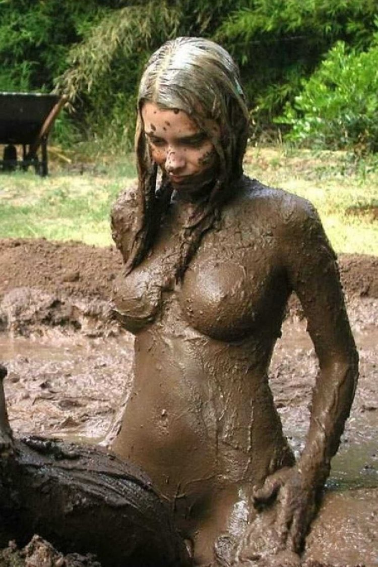 Naked beauties in mud