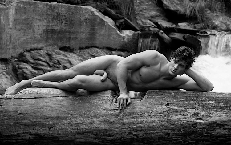 Naked men pumped on the beach