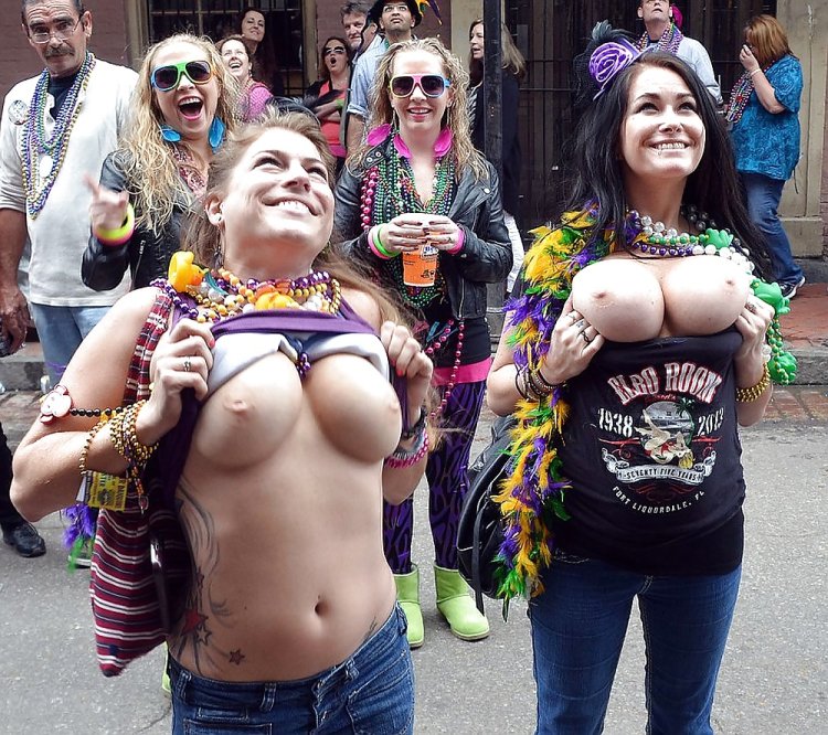 Expose breasts at the festival