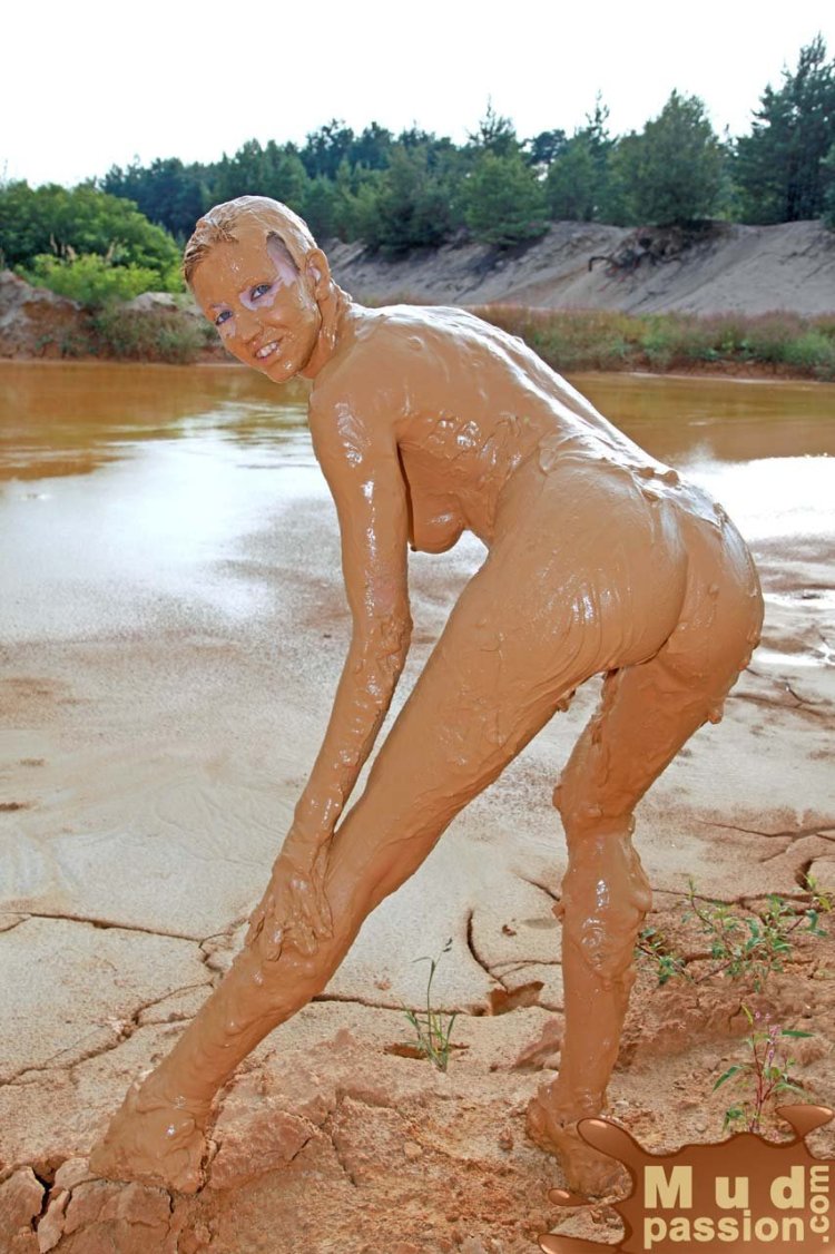 Naked swimming in the mud