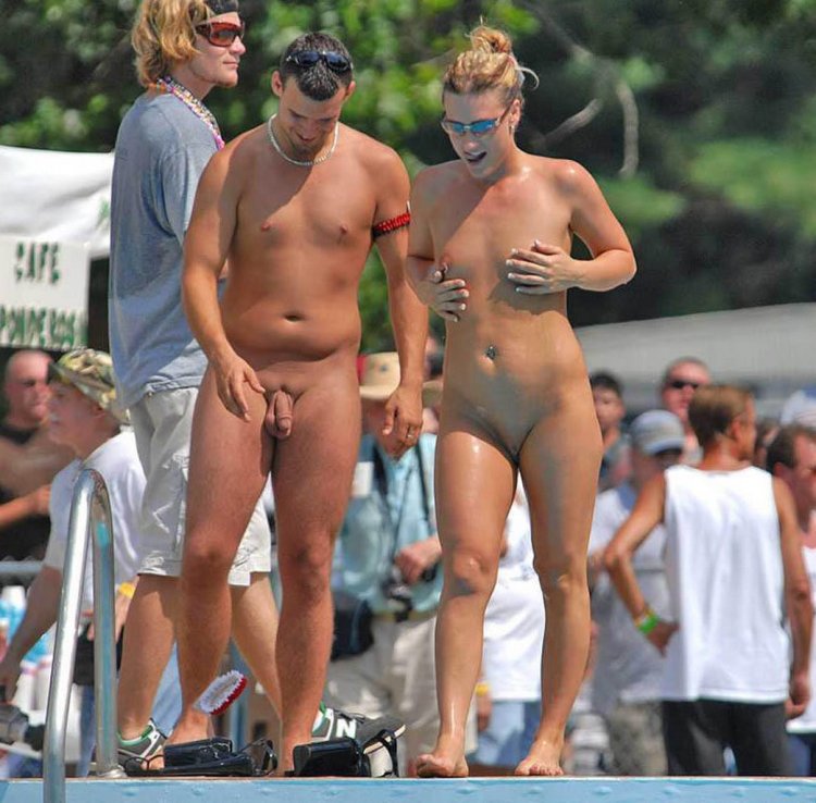 Naked men with an erection on the beach