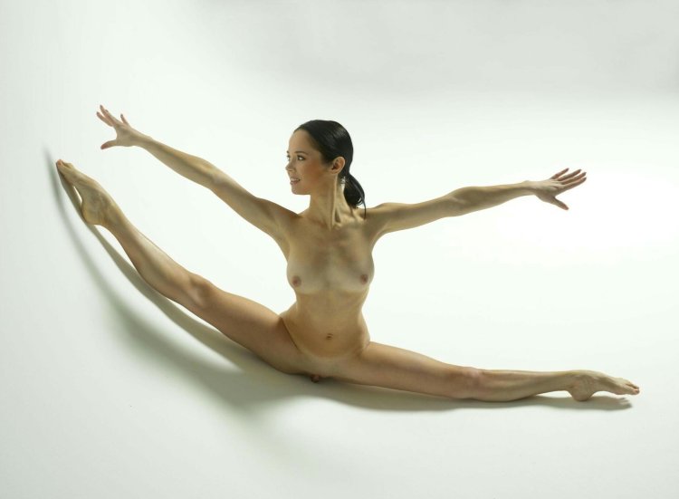 Naked beauty stretching