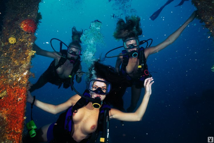 Girl under water diving