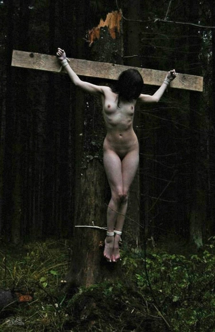 BDSM crucified on a tree