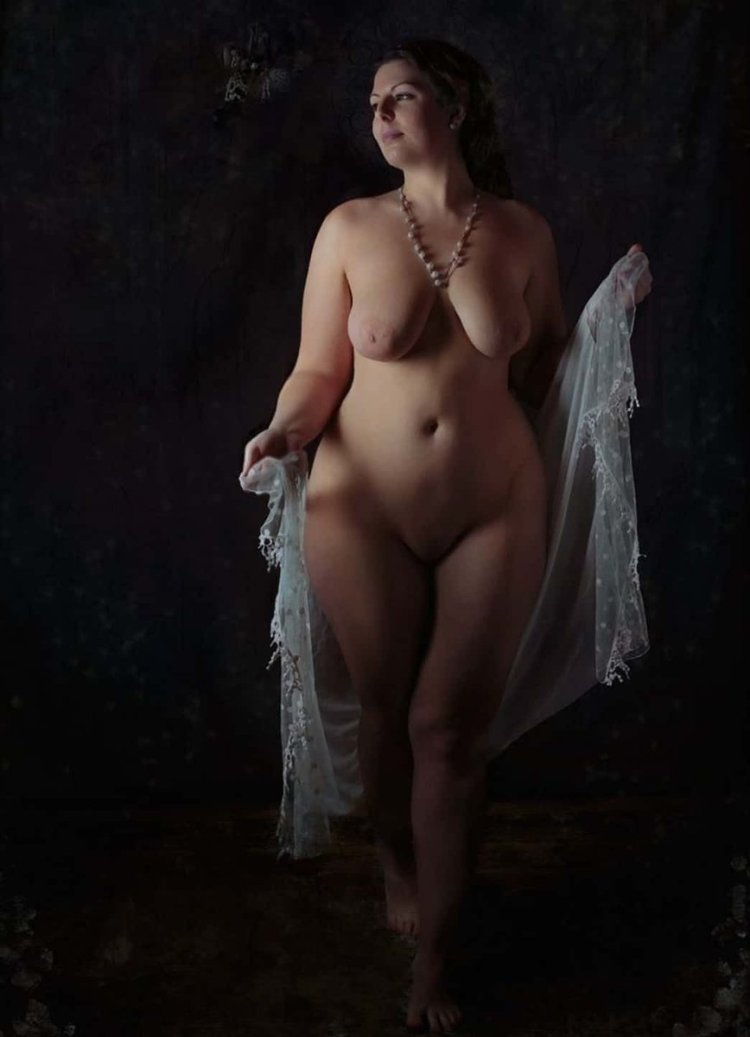Naked women pose in the studio