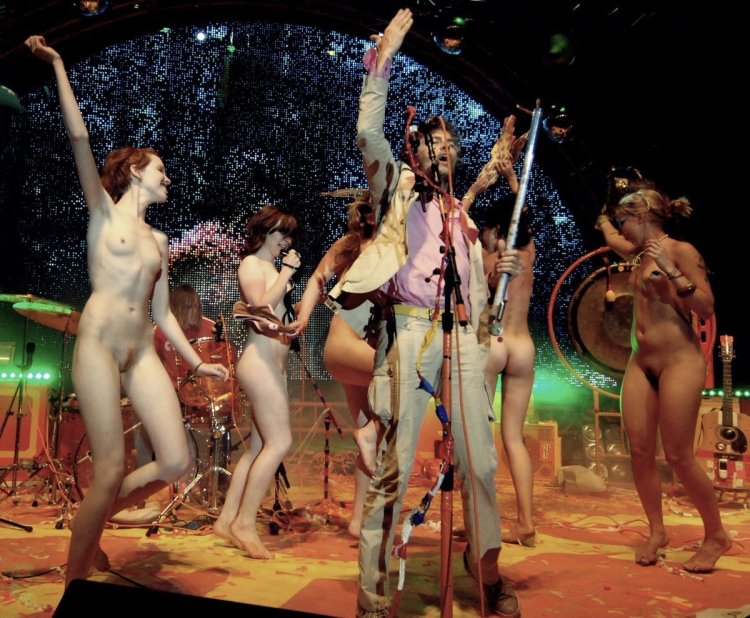 Expose breasts at the festival