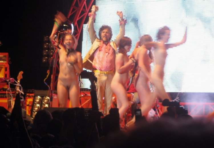 Undressed on stage at a concert