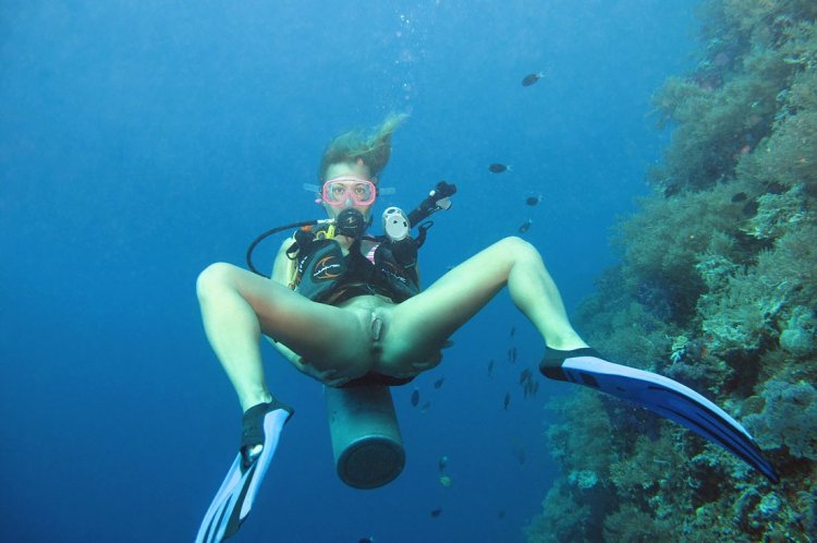 Girl under water diving