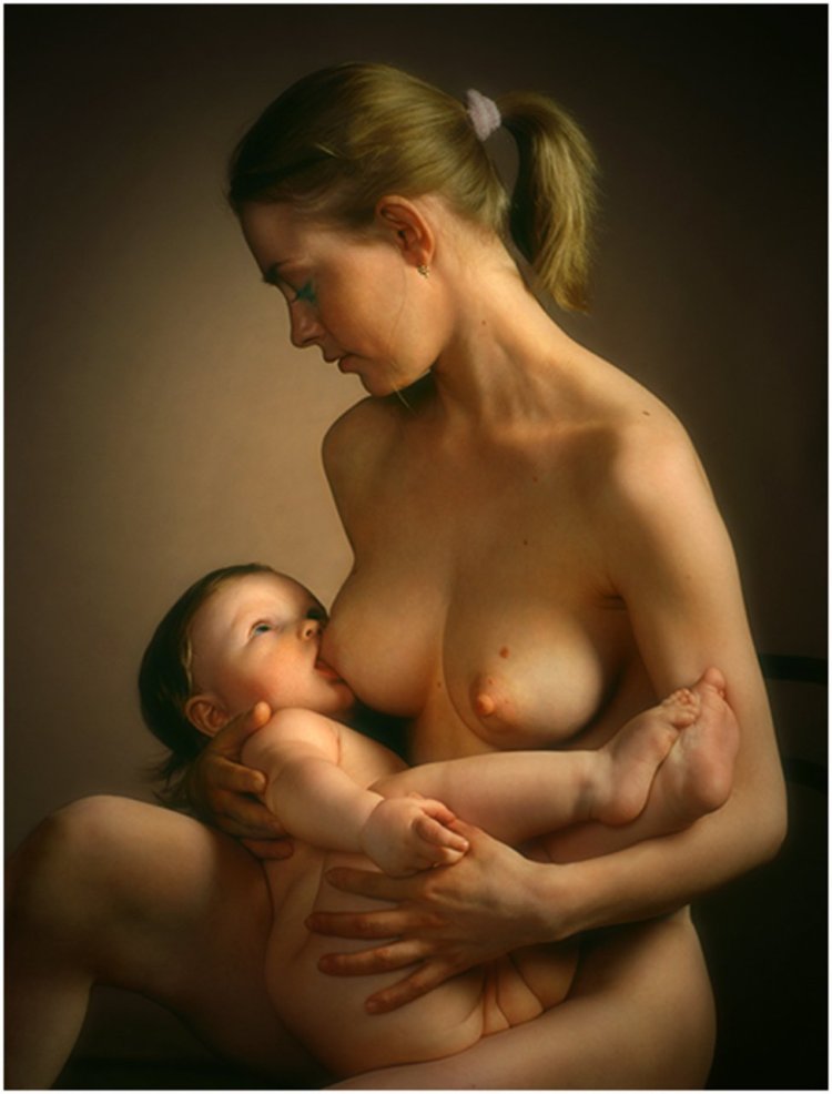 Naked woman with a baby