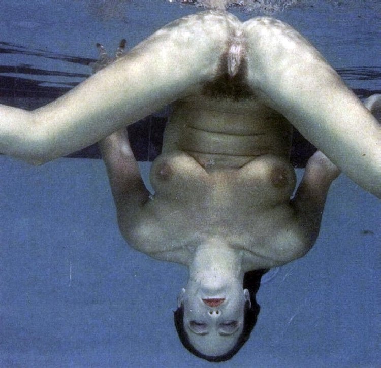 Naked women jump into the pool