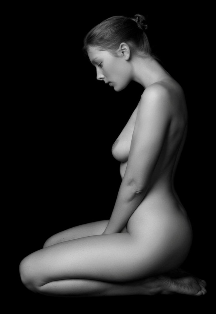 Poses for a photo shoot in the style of nude