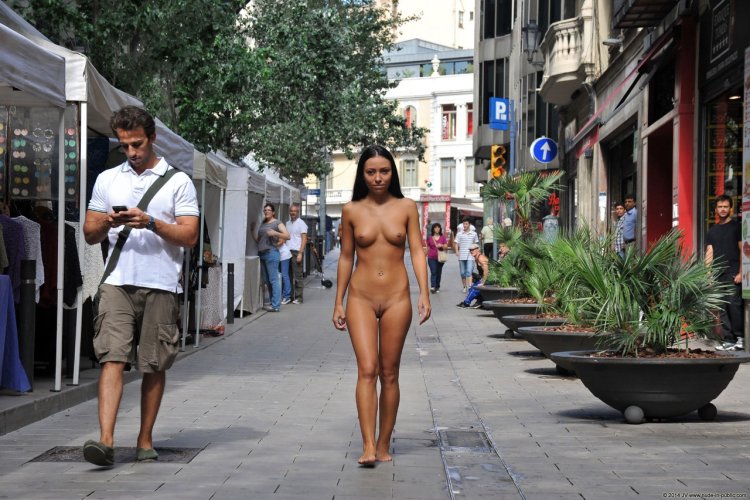 Naked mulatto in a public place