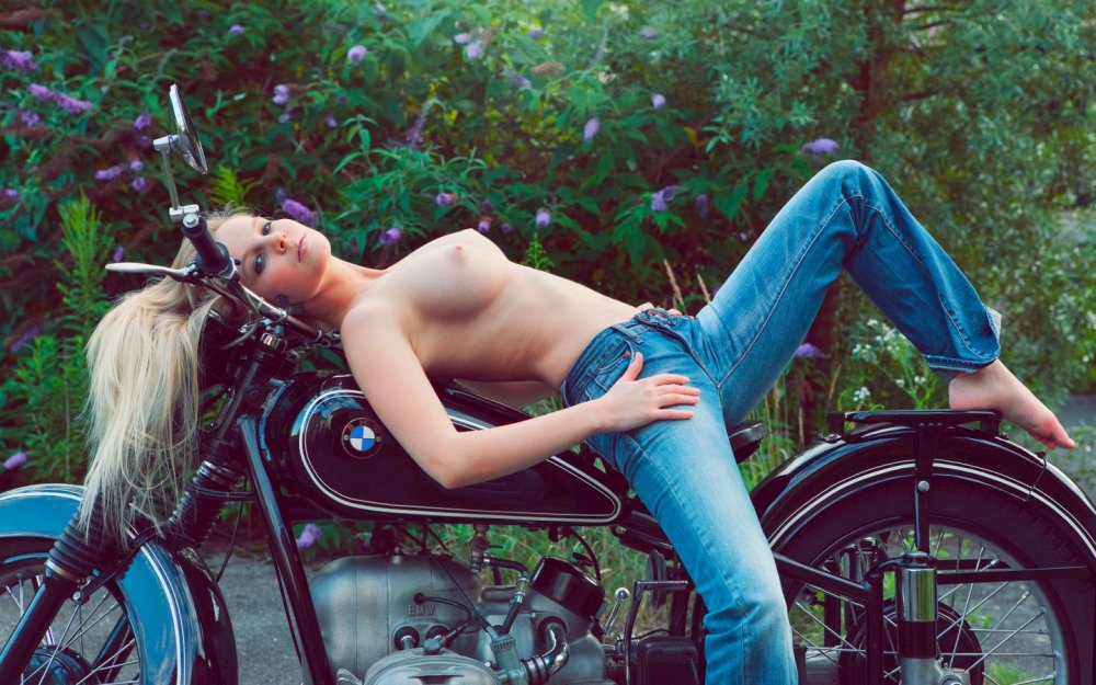 Naked girl on a motorcycle