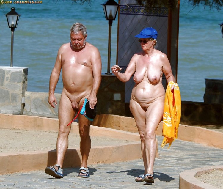 Naked fat man on the beach