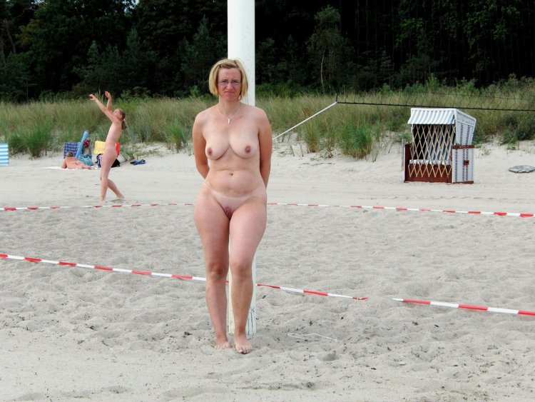 Mature nudists walk