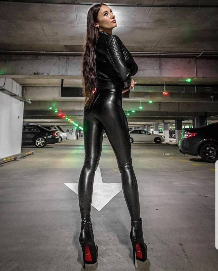 In latex on a motorcycle