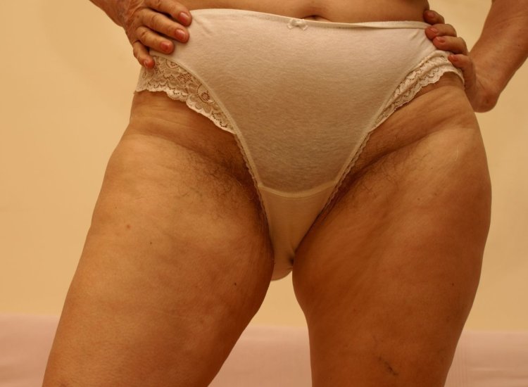 Granny Big Belly takes off her underpants