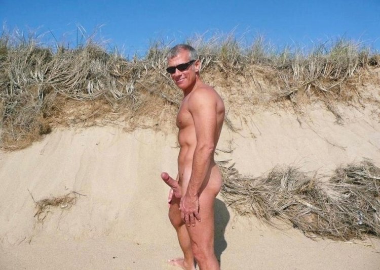 Naked man on the beach private