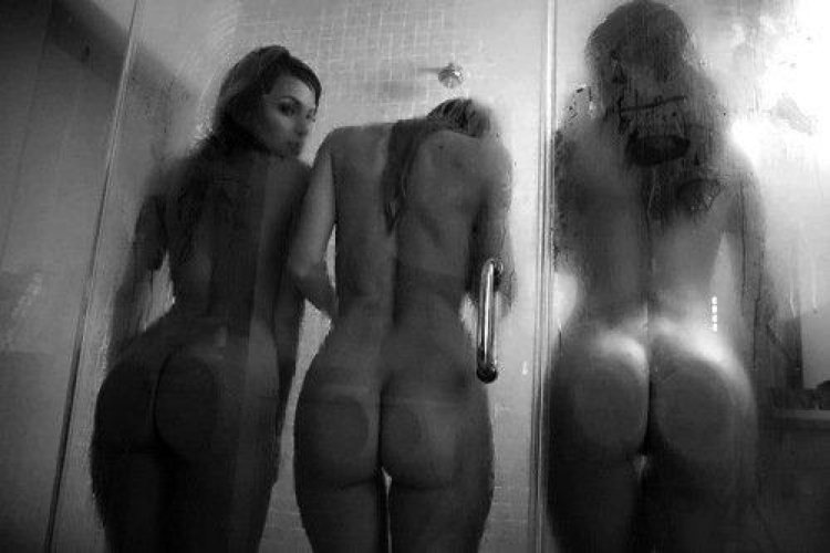 Naked buttocks behind glass