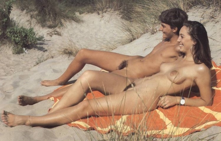 Naked young on the beach retro
