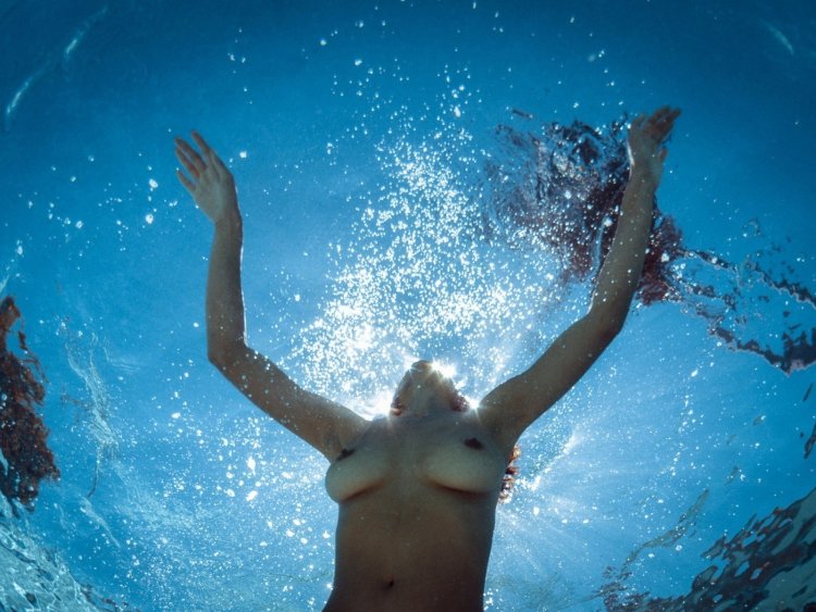 Naked girls in water