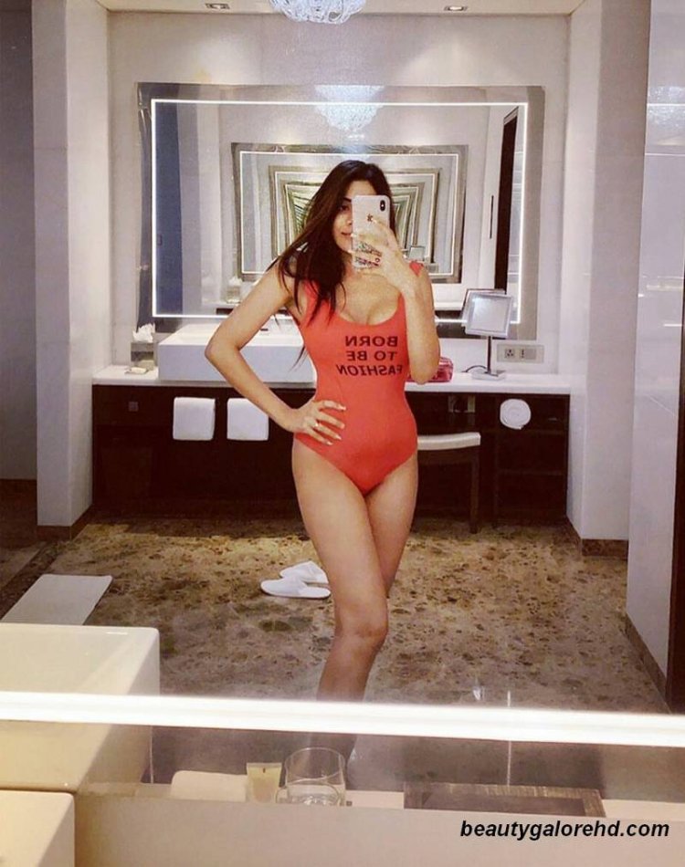 Nikki Tamboli in a swimsuit