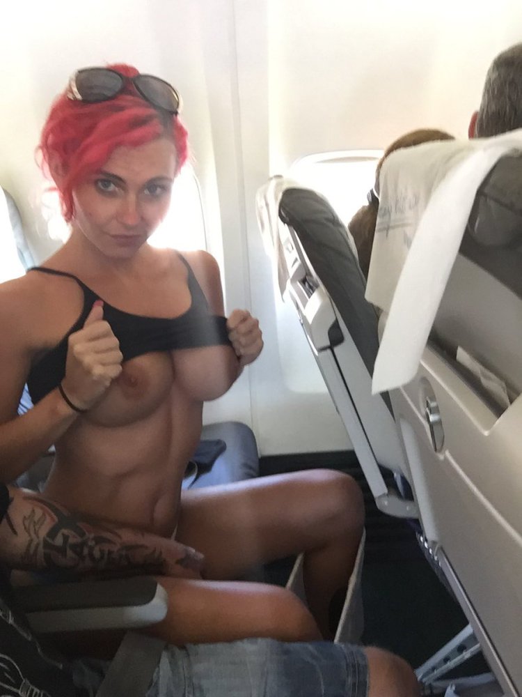 Selfies with bare breasts on an airplane
