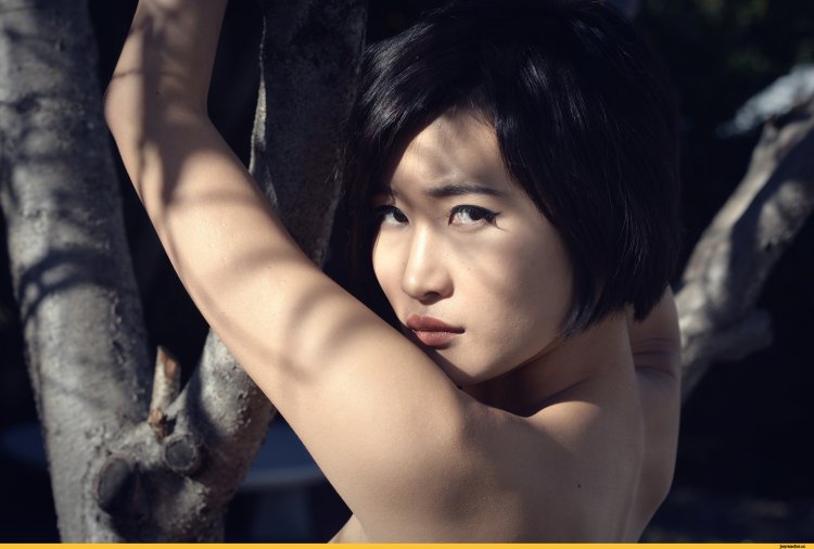 Naked Asian with a short haircut