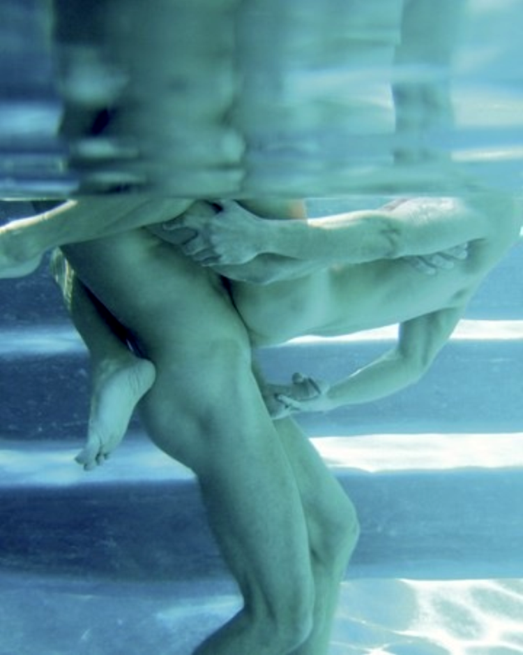Naked man underwater