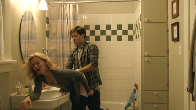 Elizabeth Banks in the bathroom