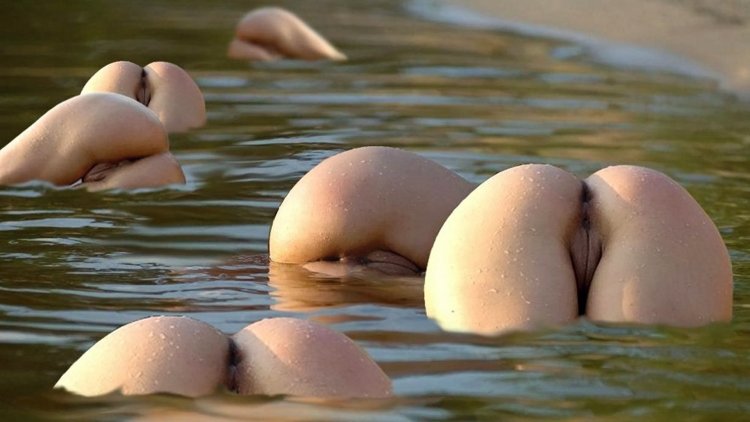 Naked female priests in water