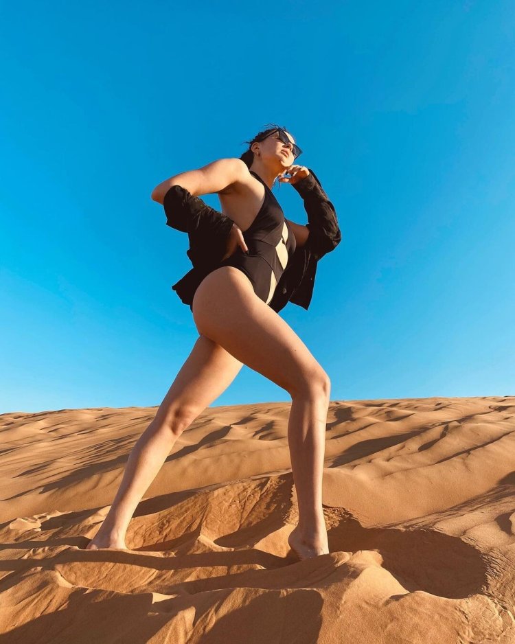 Unusual poses on the background of the desert
