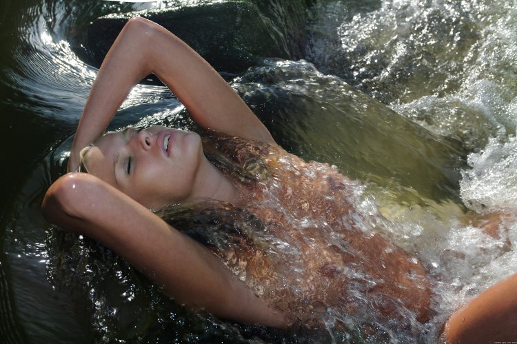 Girls swim in the lake