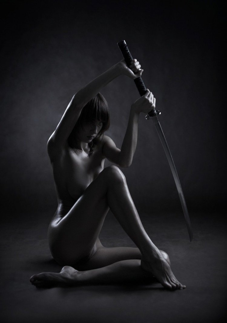 Naked woman with katana
