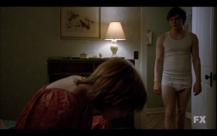 Evan Peters in shorts