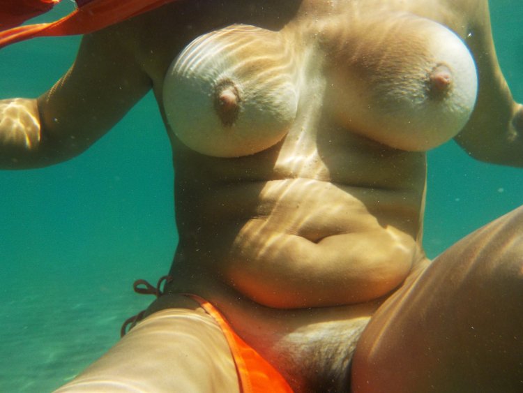 Naked fat women underwater