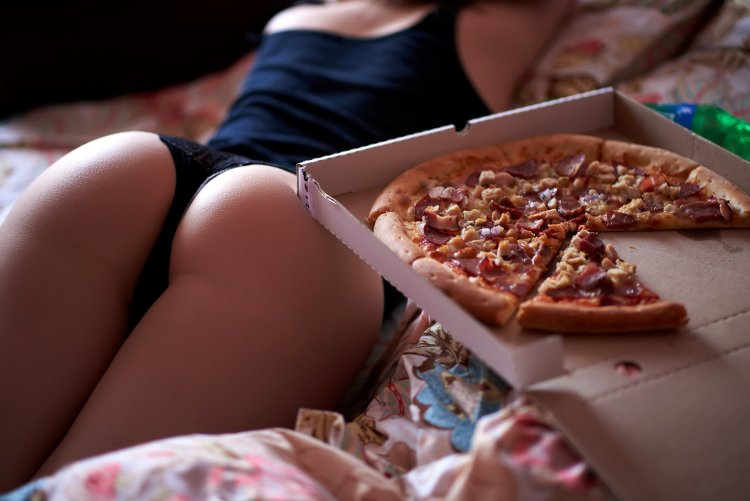 The priest is naked on the table with food