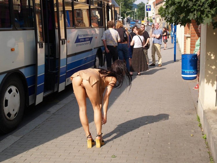 Girl without panties at a bus stop